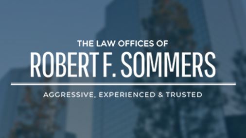 Logo with city buildings in background